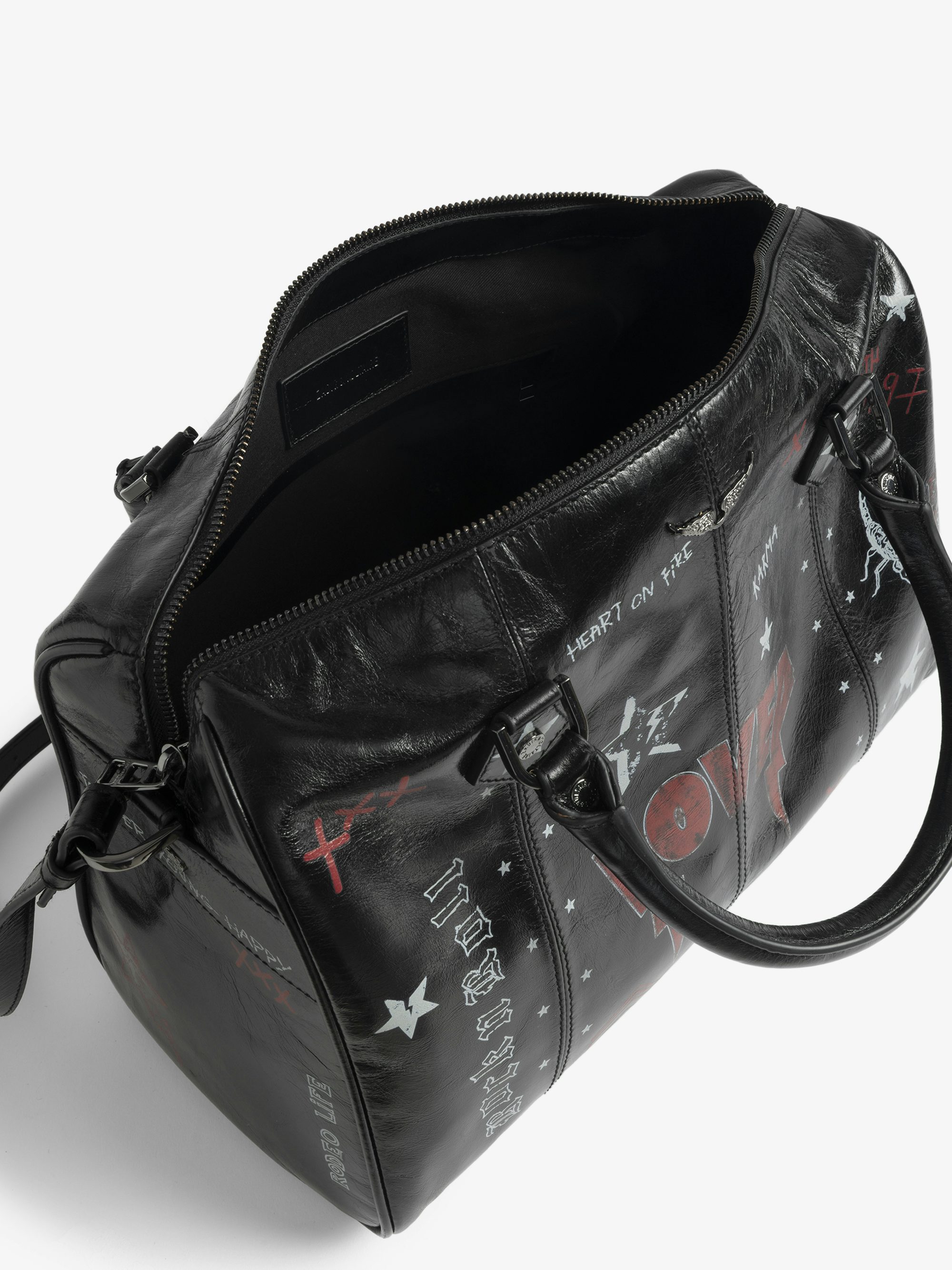 Sunny Medium Vibe Punk Bag - Patent leather effect bag with vintage-inspired punk tag, adjustable shoulder strap and wings signature.